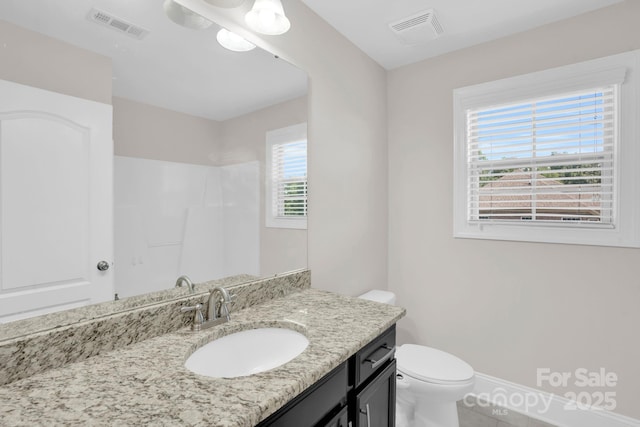 12515 Hashanli Pl, Matthews, NC 28105 - bathroom with vanity, a shower, and tile patterned flooring