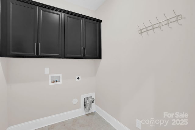 12515 Hashanli Pl, Matthews, NC 28105 - laundry area with electric dryer hookup, cabinet space, washer hookup, gas dryer hookup, and light tile patterned flooring