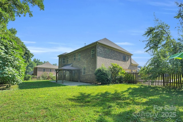 12515 Hashanli Pl, Matthews, NC 28105 - back of property featuring a gazebo, brick siding, and a patio