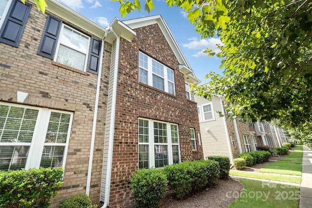8245 Viewpoint Ln, Cornelius, NC 28031 - view of property exterior featuring brick siding