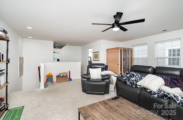 8245 Viewpoint Ln, Cornelius, NC 28031 - living area featuring carpet floors and a ceiling fan