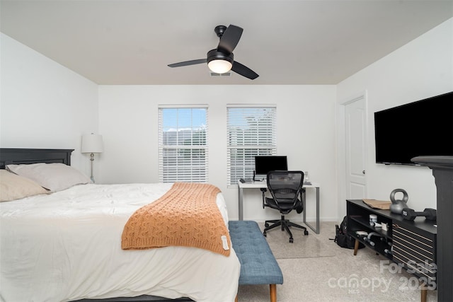 8245 Viewpoint Ln, Cornelius, NC 28031 - bedroom with light carpet, ceiling fan, and a desk