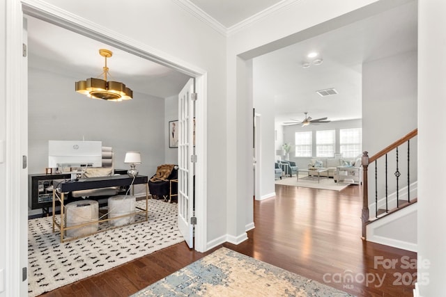 2005 Brightflower Ln, York, SC 29745 - foyer with wood finished floors, stairs, a ceiling fan, ornamental molding, and a chandelier