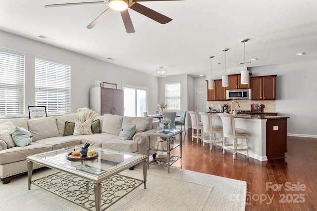 2005 Brightflower Ln, York, SC 29745 - living area with a ceiling fan and dark wood finished floors