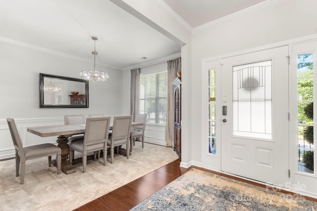2005 Brightflower Ln, York, SC 29745 - entrance foyer with dark wood finished floors, a chandelier, plenty of natural light, and ornamental molding