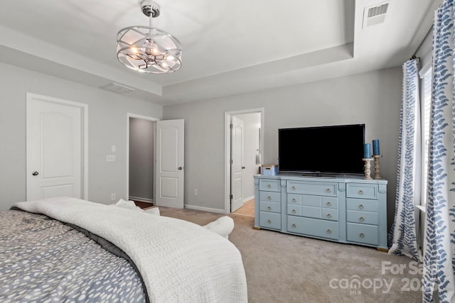 2005 Brightflower Ln, York, SC 29745 - bedroom featuring light carpet, ensuite bathroom, and a chandelier