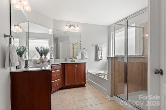 2005 Brightflower Ln, York, SC 29745 - bathroom featuring a stall shower, vanity, a bath, and tile patterned flooring
