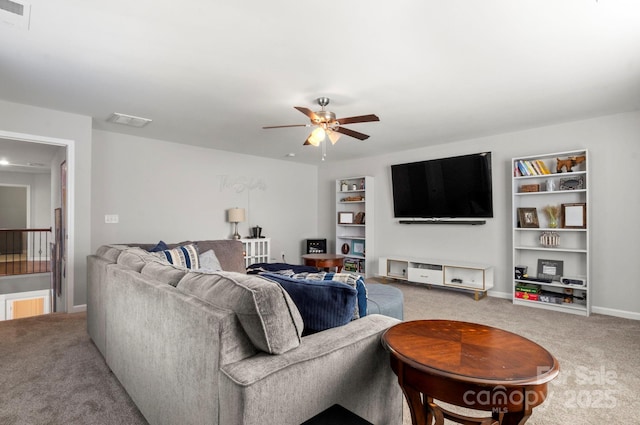 2005 Brightflower Ln, York, SC 29745 - living room with light carpet, ceiling fan, and built in shelves