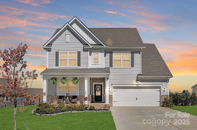 3013 Whipcord Dr, Waxhaw, NC 28173 - view of front of home featuring a porch, concrete driveway, board and batten siding, a garage, and a shingled roof
