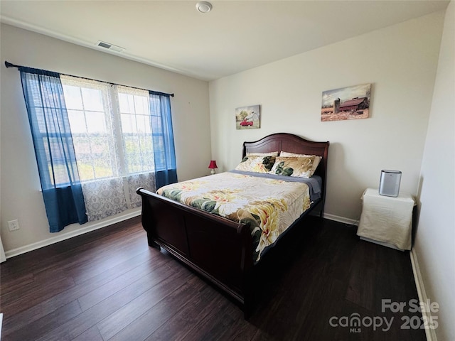 3013 Whipcord Dr, Waxhaw, NC 28173 - bedroom with baseboards and wood finished floors