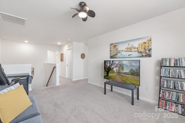 3013 Whipcord Dr, Waxhaw, NC 28173 - sitting room with an upstairs landing, carpet flooring, ceiling fan, and recessed lighting