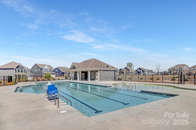 3013 Whipcord Dr, Waxhaw, NC 28173 - community pool with a residential view and a patio area