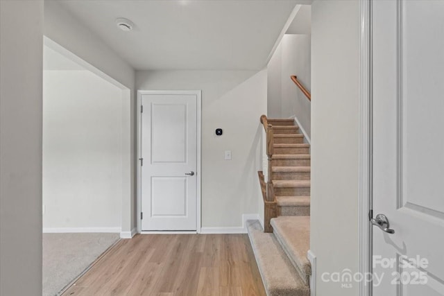 512 Whitehall Cir, Durham, NC 27713 - stairs with wood finished floors and baseboards