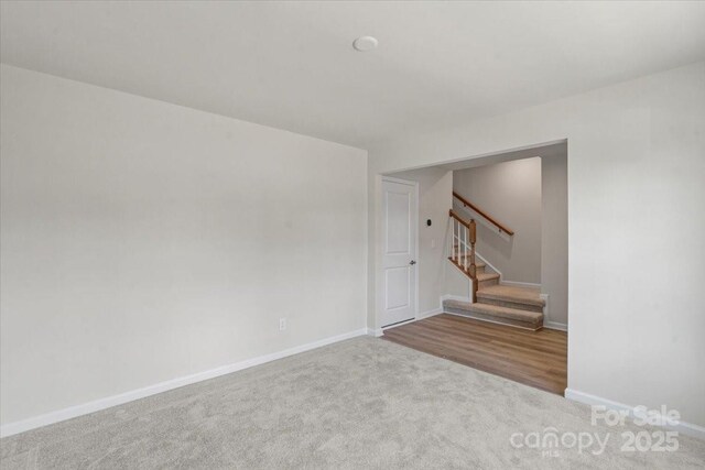 512 Whitehall Cir, Durham, NC 27713 - carpeted spare room featuring stairway and baseboards