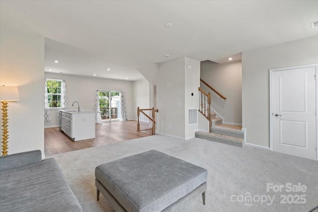 512 Whitehall Cir, Durham, NC 27713 - carpeted living area featuring recessed lighting and baseboards