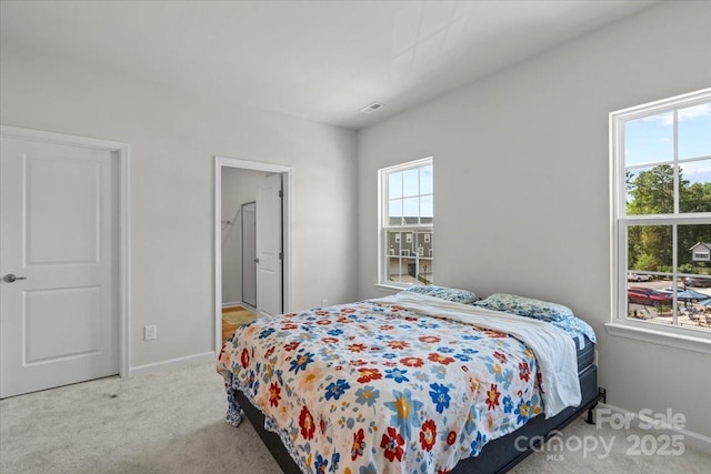 512 Whitehall Cir, Durham, NC 27713 - bedroom with carpet and baseboards
