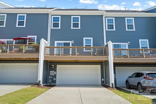 512 Whitehall Cir, Durham, NC 27713 - back of house featuring concrete driveway and an attached garage