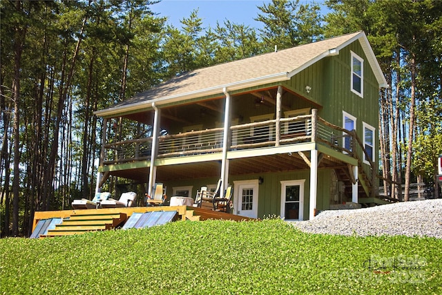 1594 High Valley Way, Lenoir, NC 28645 - back of house featuring roof with shingles, a lawn, a wooden deck, and a balcony