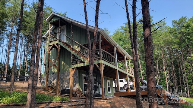 1594 High Valley Way, Lenoir, NC 28645 - back of house with a wooden deck and board and batten siding