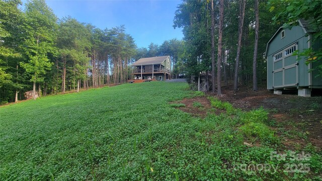 1594 High Valley Way, Lenoir, NC 28645 - view of grassy yard with a shed