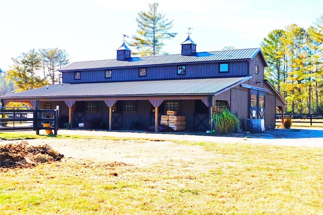 1594 High Valley Way, Lenoir, NC 28645 - view of front of home featuring a standing seam roof, a chimney, an exterior structure, and a metal roof