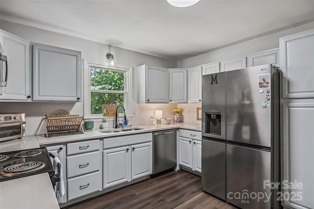 207 Jacksons Run, Morganton, NC 28655 - kitchen featuring stainless steel appliances, light countertops, dark wood-style flooring, and white cabinetry