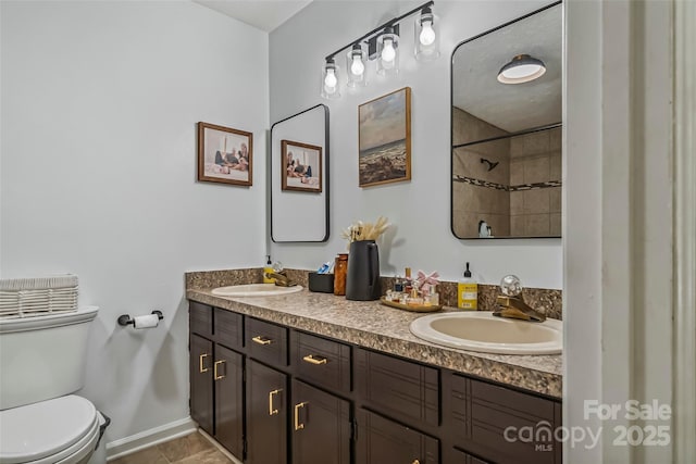207 Jacksons Run, Morganton, NC 28655 - bathroom featuring double vanity, a shower, and tile patterned flooring
