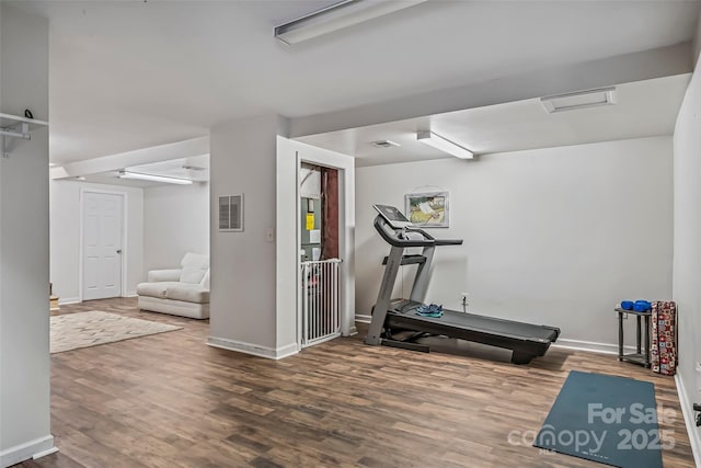 207 Jacksons Run, Morganton, NC 28655 - exercise room featuring wood finished floors and baseboards