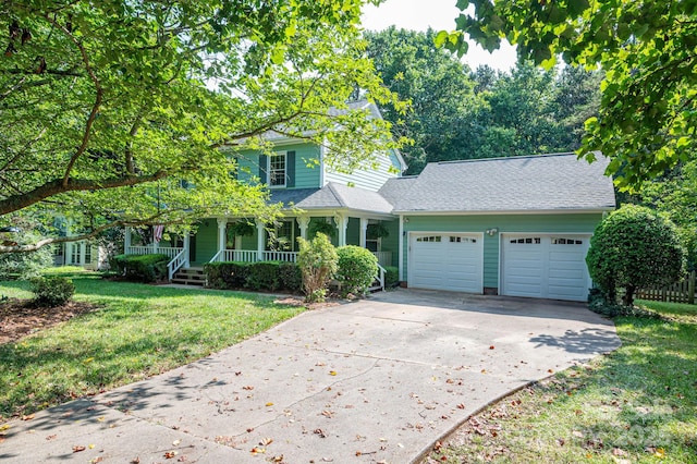 14409 Hackamore Dr, Matthews, NC 28105 - view of front facade with a garage, driveway, roof with shingles, and a porch
