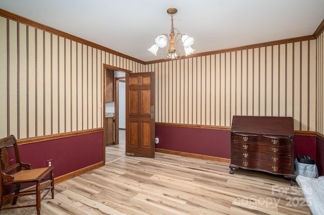 14409 Hackamore Dr, Matthews, NC 28105 - sitting room with wood finished floors, crown molding, and a chandelier
