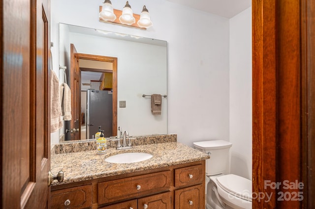 14409 Hackamore Dr, Matthews, NC 28105 - bathroom featuring vanity and toilet