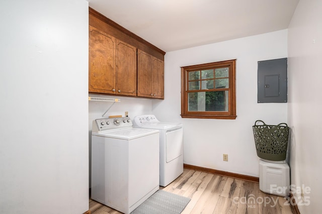 14409 Hackamore Dr, Matthews, NC 28105 - laundry area with separate washer and dryer, light wood-style floors, cabinet space, and electric panel
