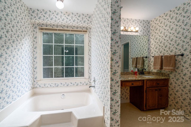14409 Hackamore Dr, Matthews, NC 28105 - bathroom with a bath, wallpapered walls, vanity, tile patterned flooring, and plenty of natural light