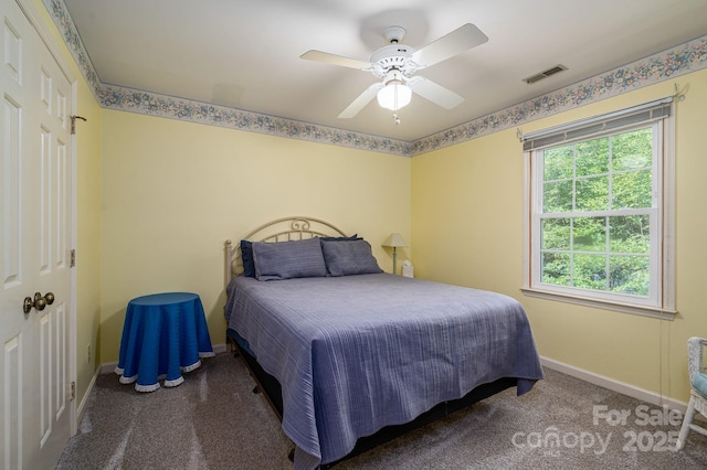 14409 Hackamore Dr, Matthews, NC 28105 - carpeted bedroom with baseboards and a ceiling fan