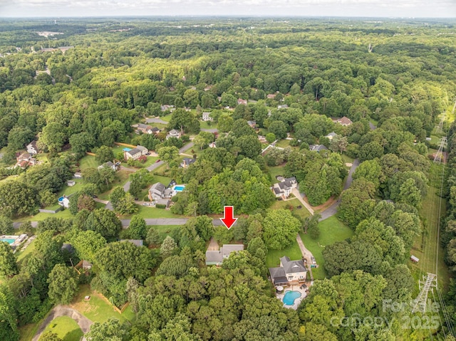 14409 Hackamore Dr, Matthews, NC 28105 - view of property location featuring a forest