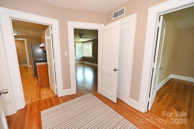737 8th St SW, Hickory, NC 28602 - corridor featuring light wood-style floors and baseboards