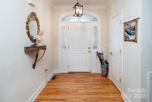 122 Hazeltine Ct, Salisbury, NC 28144 - entrance foyer featuring light wood-style floors and ornamental molding