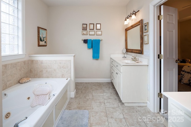 122 Hazeltine Ct, Salisbury, NC 28144 - bathroom with vanity and a tub with jets