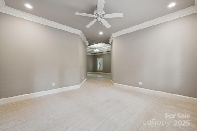 18802 Pentwater Ct, Cornelius, NC 28031 - spare room with ornamental molding, recessed lighting, light carpet, a ceiling fan, and a chandelier