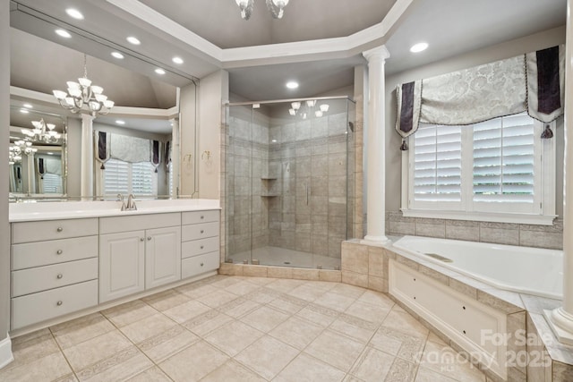 18802 Pentwater Ct, Cornelius, NC 28031 - full bath with ornate columns, recessed lighting, vanity, a garden tub, and a shower stall