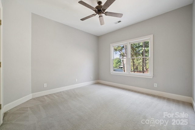18802 Pentwater Ct, Cornelius, NC 28031 - spare room with carpet floors and ceiling fan