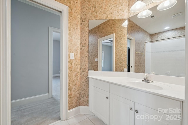 18802 Pentwater Ct, Cornelius, NC 28031 - bathroom featuring wallpapered walls, vanity, and a shower