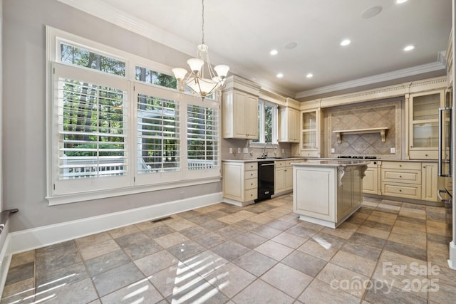 18802 Pentwater Ct, Cornelius, NC 28031 - kitchen with cream cabinets, black dishwasher, crown molding, tasteful backsplash, and a chandelier