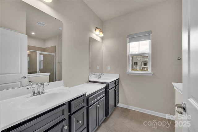 2004 Dornoch Rd, Tega Cay, SC 29708 - bathroom featuring double vanity, a stall shower, and tile patterned floors