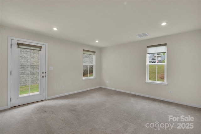 2004 Dornoch Rd, Tega Cay, SC 29708 - spare room with recessed lighting and carpet flooring