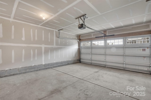 2004 Dornoch Rd, Tega Cay, SC 29708 - garage featuring a garage door opener