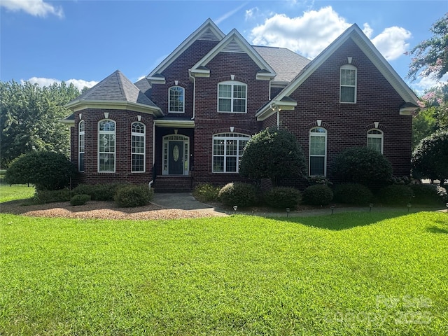 3005 Monterrey Ln, Monroe, NC 28110 - traditional home with brick siding and a front lawn