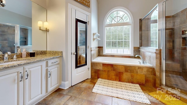3005 Monterrey Ln, Monroe, NC 28110 - bathroom featuring vanity, a garden tub, and a stall shower