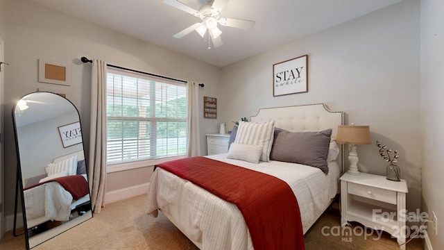 3005 Monterrey Ln, Monroe, NC 28110 - bedroom featuring light carpet and a ceiling fan