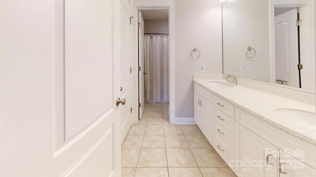3005 Monterrey Ln, Monroe, NC 28110 - bathroom with double vanity and tile patterned floors